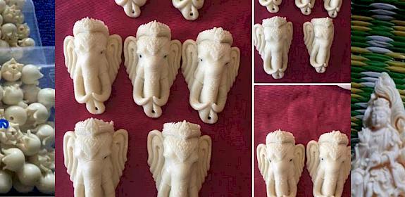 Ivory beads, Ganesha pendants said to be made from ivory powder, and ivory statues, all advertised on social media © TRAFFIC