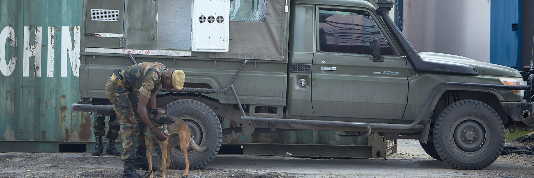 Mombasa port in Kenya has been identified by authorities as one of the key transit hubs for illegal wildlife parts and other illicit goods (drugs and arms). Sniffer dogs and dog handlers are used at the port for identifying smuggled goods. © Juozas Cernius / WWF-UK