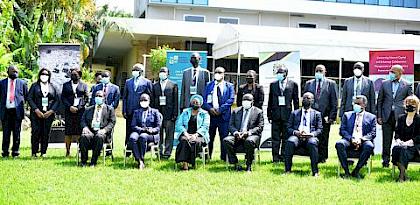 Hon. Bazivamo, in the middle, front row with the DPP of Tanzania on his right and the acting Arusha RC on his left posing in a photo with DPPs and Julie Thomson during the EAAP Conference