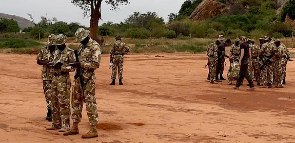 KWS instructors analysing dynamics of human tracks, Manyani KWS Law Enforcement Academy, Kenya